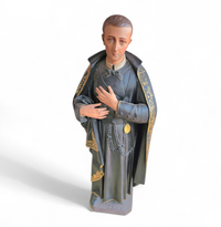 Statue of a religious figure / Patron Saint Gerard Majella / placed in a Gothic niche / labeled /