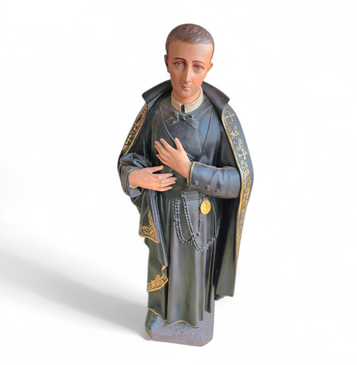 Statue of a religious figure / Patron Saint Gerard Majella / placed in a Gothic niche / labeled /