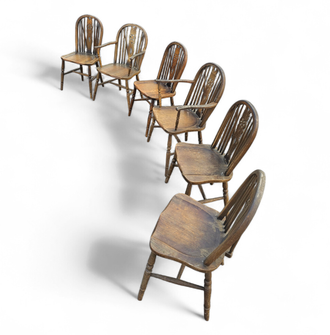 A bit wearthered windsor wheelback dining set (7) by the Oirschotse meubelindustrie 1950s