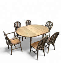 A bit wearthered windsor wheelback dining set (7) by the Oirschotse meubelindustrie 1950s