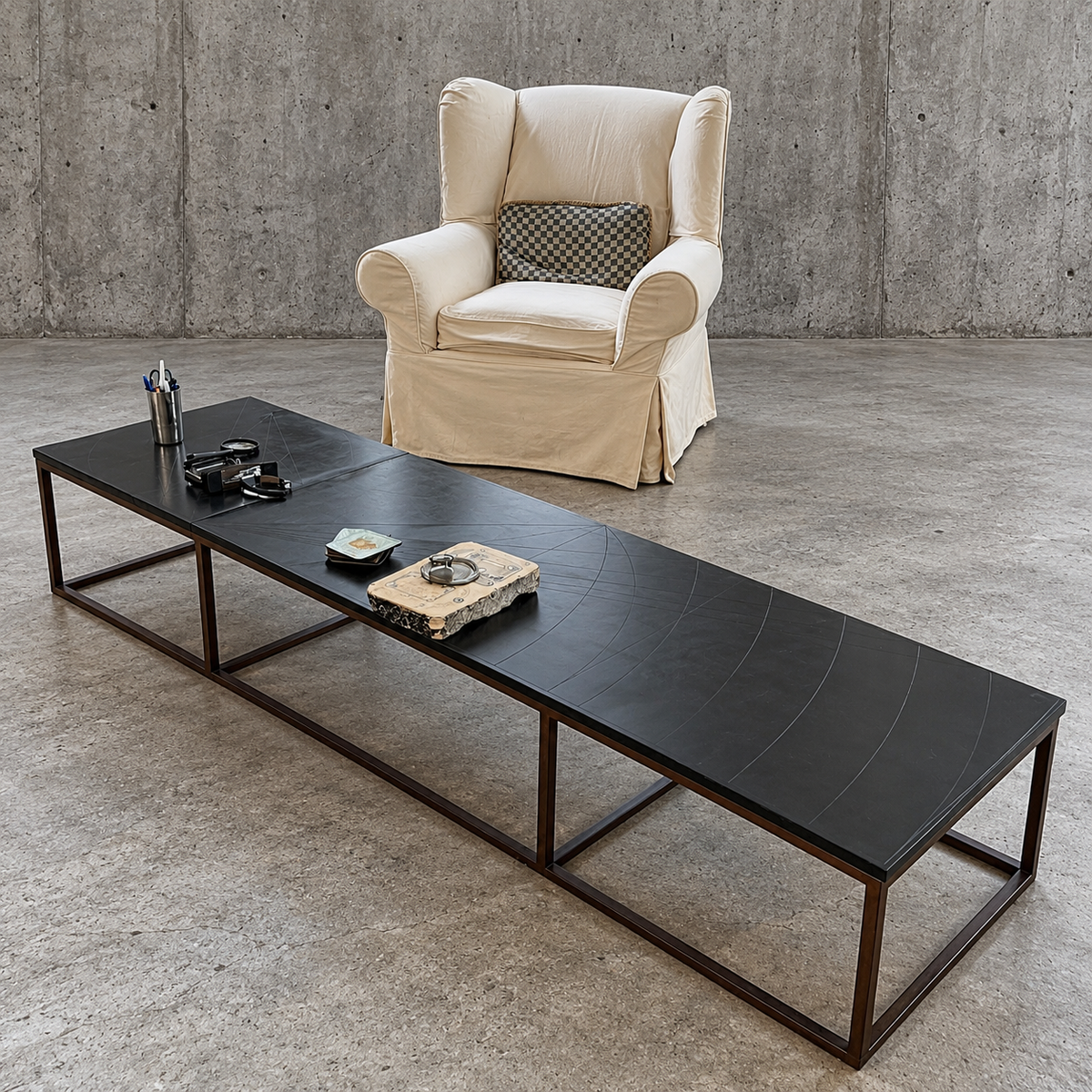 Weighty coffee table / solid iron frame / stone slate table tops / made on commission by architect Alex Vervoordt / Belgium 1990s /