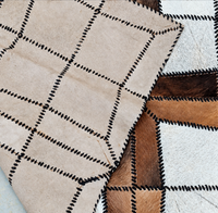 Lace-up cowhide patchwork rug / 1980s