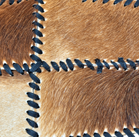 Lace-up cowhide patchwork rug / 1980s