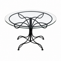 Wrought iron Frédéric Weinberg dining set with glass top / 1970s
