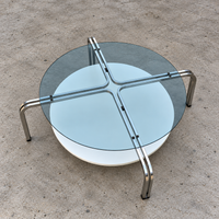 Rare coffee table / solid steel with a low free standing table / 1980s