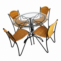Wrought iron Frédéric Weinberg dining set with glass top / 1970s