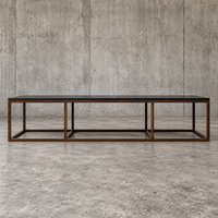 Weighty coffee table / solid iron frame / stone slate table tops / made on commission by architect Alex Vervoordt / Belgium 1990s /