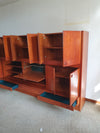 Grote wandkast V-vorm 360 x 175 cm
 Bestaat uit 4 boven delen ( met bureauklep) en 4 onderdelen met lades jaren 60