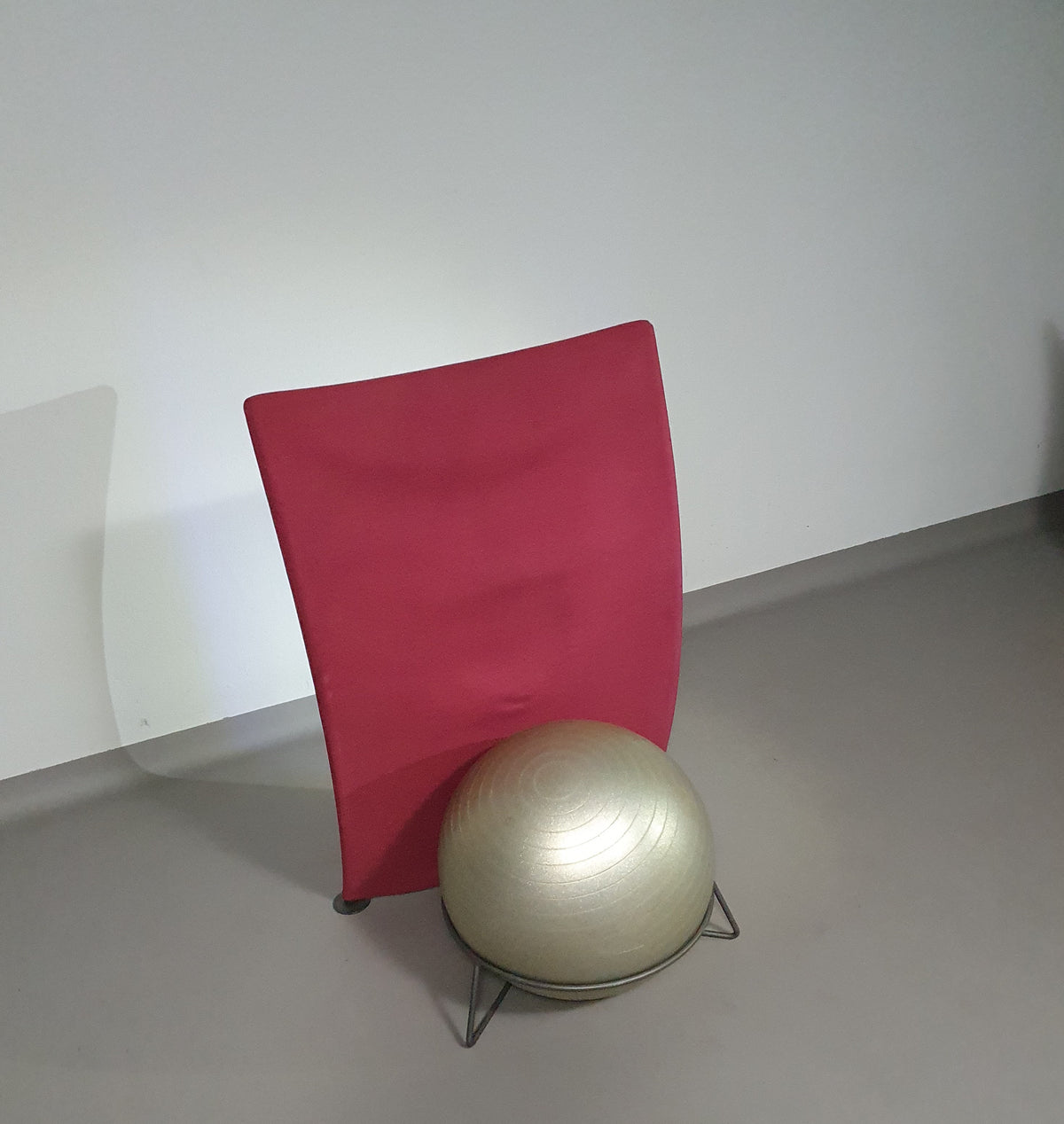 Italian modern bordeaux red ball armchair San Siro designed by Fabrizio Ballardini, 1995