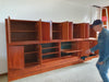 Grote wandkast V-vorm 360 x 175 cm
 Bestaat uit 4 boven delen ( met bureauklep) en 4 onderdelen met lades jaren 60