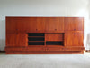Grote wandkast V-vorm 360 x 175 cm
 Bestaat uit 4 boven delen ( met bureauklep) en 4 onderdelen met lades jaren 60