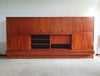 Grote wandkast V-vorm 360 x 175 cm
 Bestaat uit 4 boven delen ( met bureauklep) en 4 onderdelen met lades jaren 60