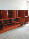 Grote wandkast V-vorm 360 x 175 cm
 Bestaat uit 4 boven delen ( met bureauklep) en 4 onderdelen met lades jaren 60