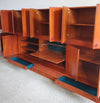 Grote wandkast V-vorm 360 x 175 cm
 Bestaat uit 4 boven delen ( met bureauklep) en 4 onderdelen met lades jaren 60