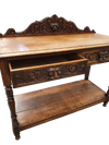 Victoriaanse gotische eikenhouten bijzettafel, decoratief gesneden rond 1920. Groene maskerdecoratie