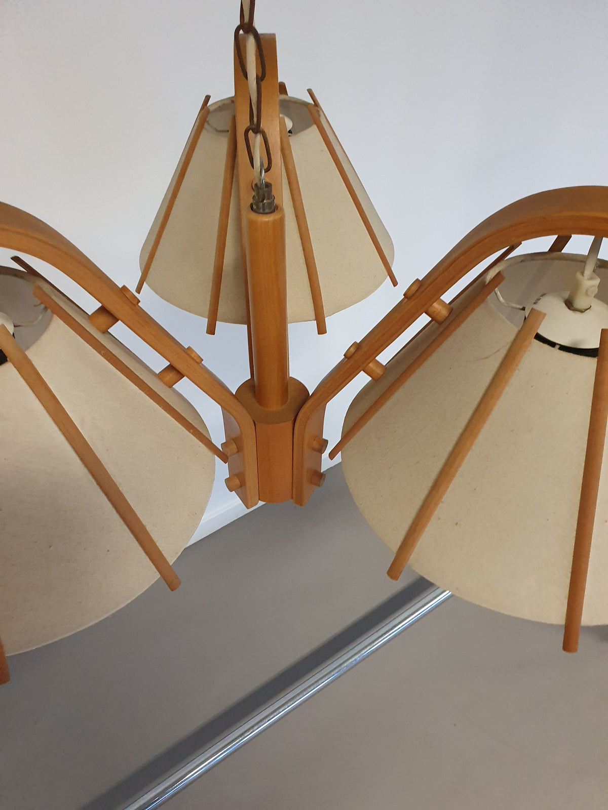A rare bent beech and fabric three-branch ceiling pendant light by J Wickelgren and M Strandang for Aneta., Sweden. 1970s. Measure 67cm width x 40cm high.