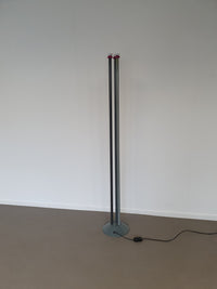 Trilumen floor lamp by Hans Von Klier for Bilumen Milano. Lamp uses halogen light bulbs. Floor lamp measures 175 x 30 cm